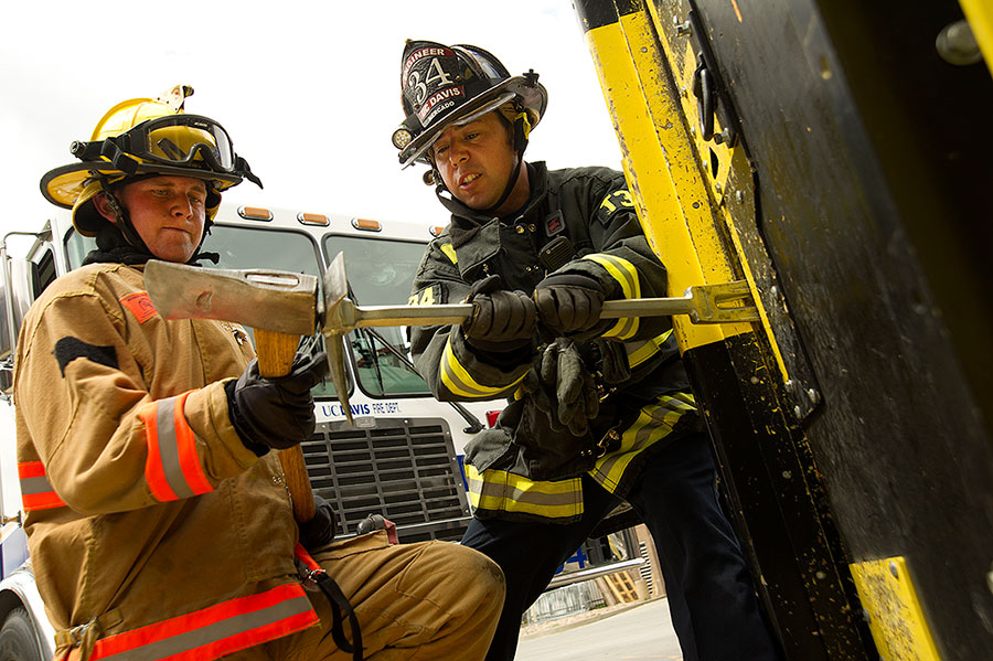 Cess Mercado works with new firefighter Michael McCartney