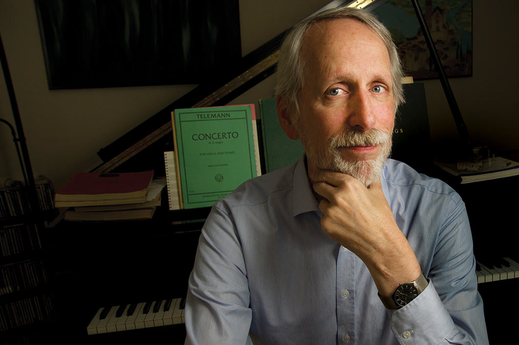 Christopher Reynolds at his piano