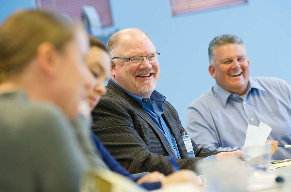 Perry Gee with colleagues